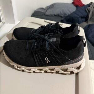 On Running Men's Black and White Athletic Shoes